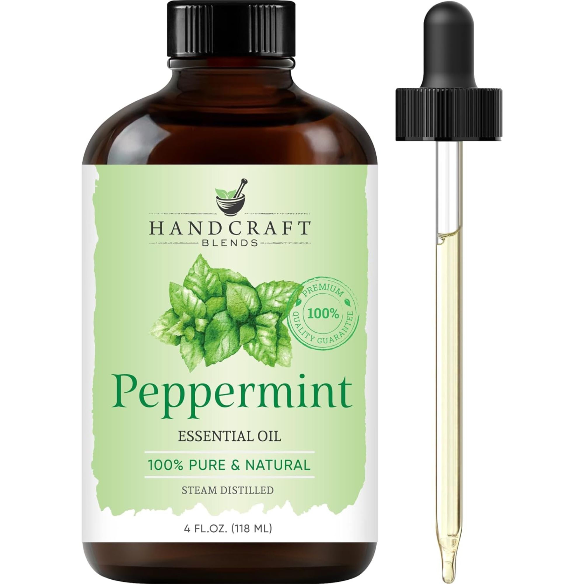 Une bouteille brune d'huile de menthe poivrée avec une étiquette verte et une pipette
