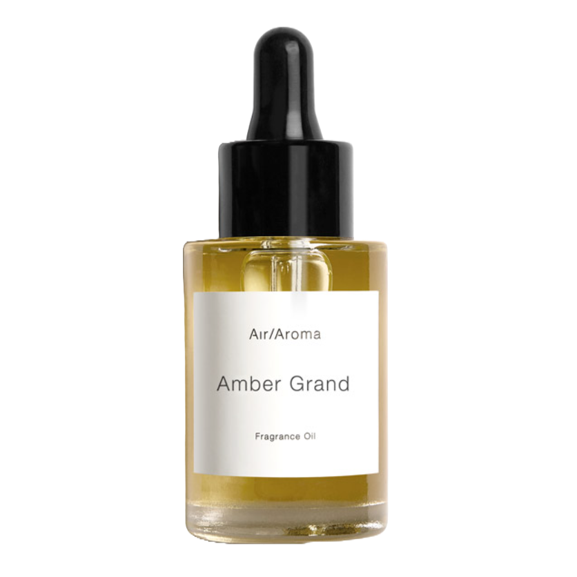 Une photo de produit de la bouteille d'huile de parfum Amber par arôme aérien