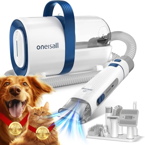 Oneisall Dog Hair Visuum & Dog To couching Kit avec chien de gingembre et chat avec des médailles d'or autour de leur cou devant le kit de toilettage sur fond blanc.