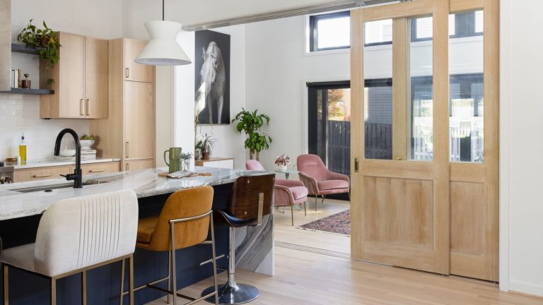 A large kitchen with seating area
