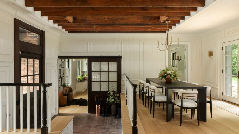 carriage house beamed dining room black table