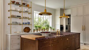 A white and wood kitchen decorated with wooden cutting boards