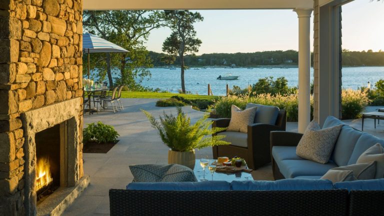 Outdoor living room fireplace in early fall