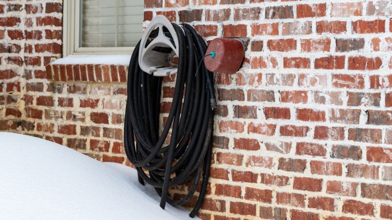 A faucet cover during snow