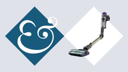 Shark PowerDetect Cordless Vacuum cleaner bending at the wand, on tile background next to Homes &amp; Gardens '&amp;' logo