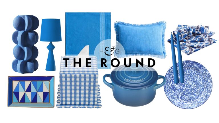 Cerulean home decor, including a vase, trinket dish, table lamp, tissue cover, tablecloth, Dutch oven, cushion cover, taper candles, dinner plate, and patterned napkins, pictured on a white background