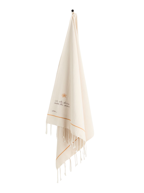 Serviette de plage à détails brodés