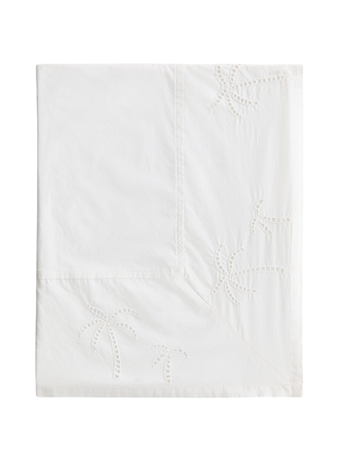 Nappe avec broderie à œillets