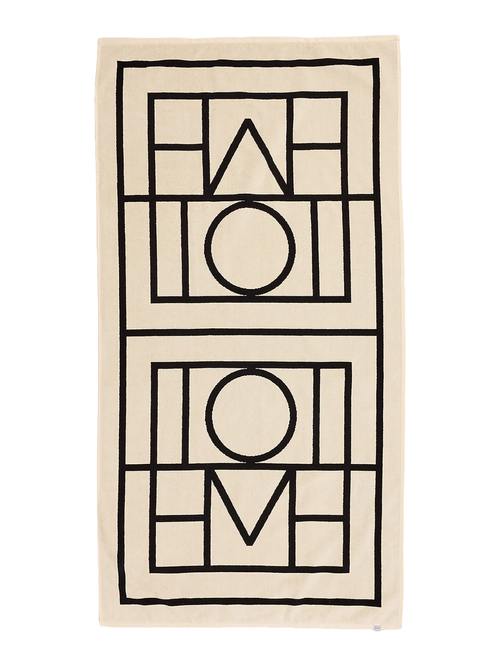 Serviette de plage en jacquard à monogramme Toteme