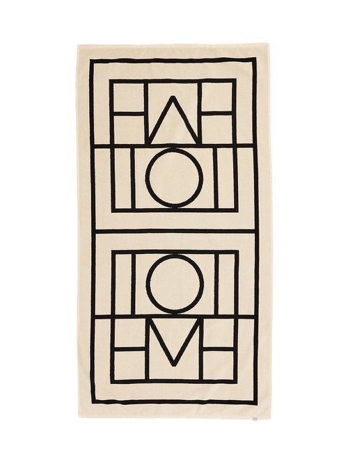 Serviette de plage en jacquard à monogramme Toteme