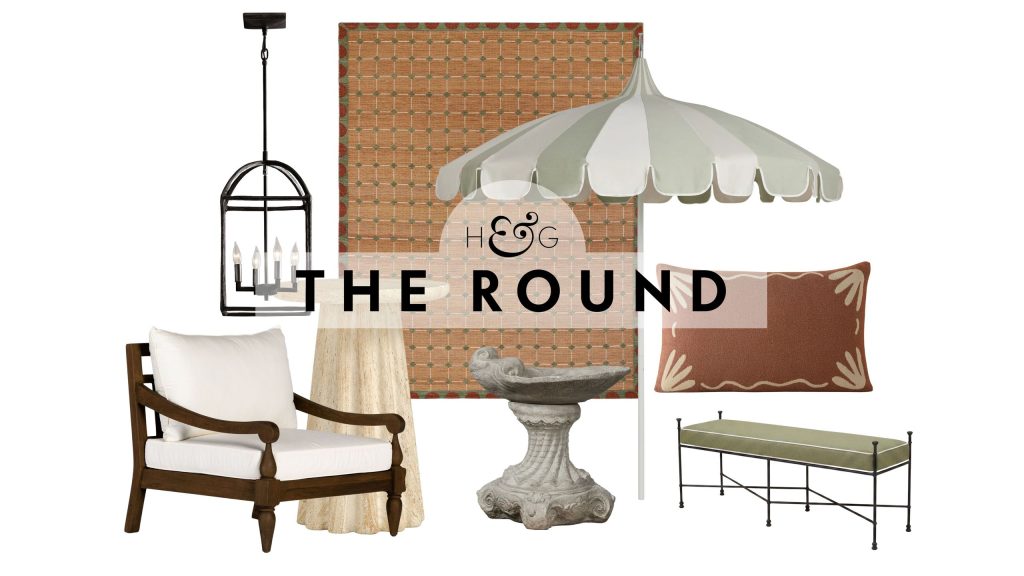 Tuscan villa inspired outdoor decor pieces, including a teak wood armchair, iron pendant light, travertine side table, mosaic tile rug, bird bath, pagoda umbrella, lumbar pillow, and iron bench