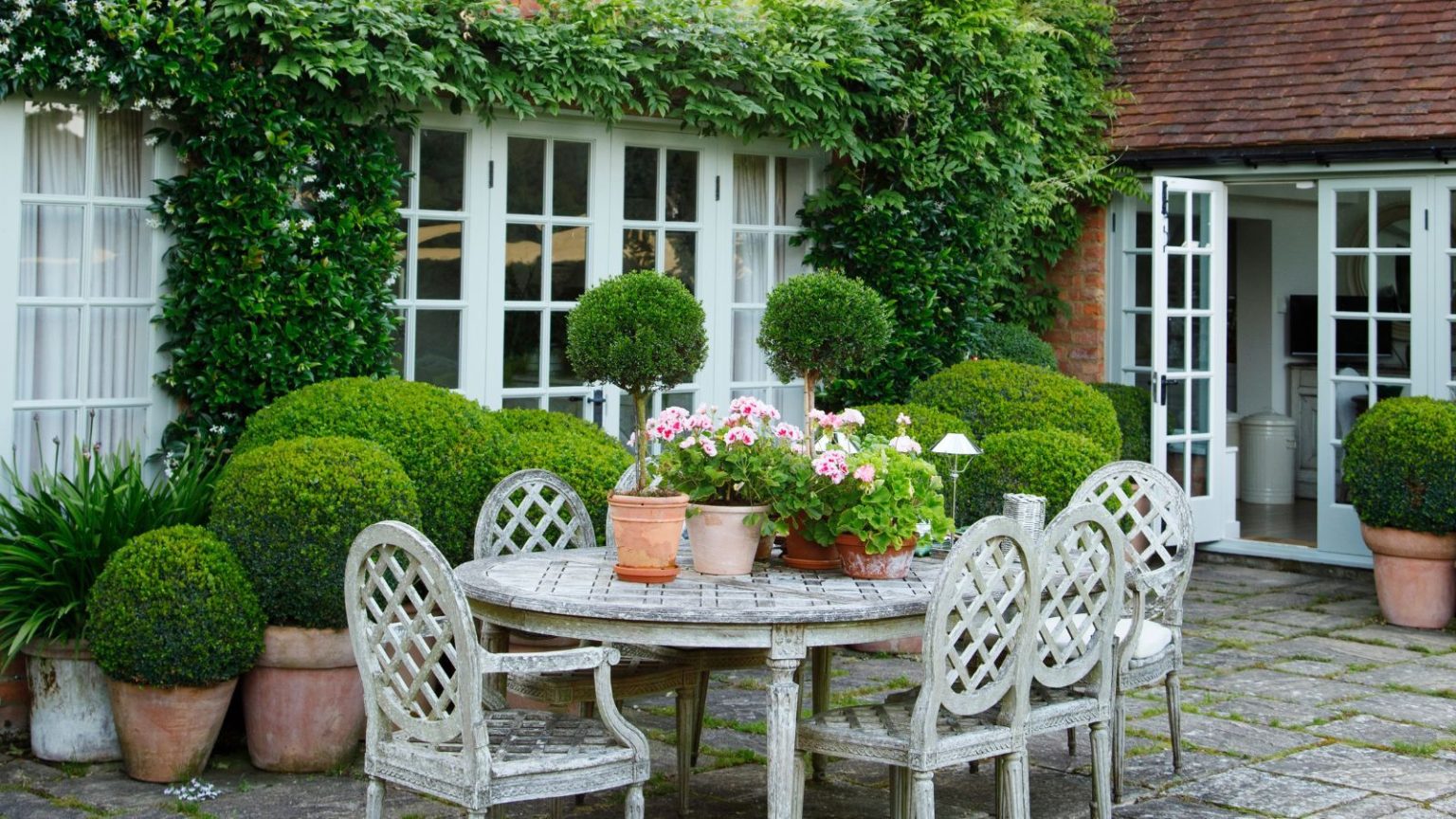 Patio with wooden traditional furniture